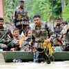 Army personnel rescue trapped villagers from Dhekial village in Assam’s Nagaon district on Sunday.