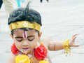 Cute kids dressed up as Lord Krishna