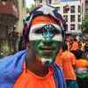 A 'Govinda' gets his face painted in saffron, white and green in Mumbai (Photo courtesy: KK Choudhary)