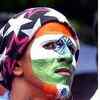 A reveller with the Indian tricolour painted on his face enjoying Dahi Handi celebrations in Mumbai. (TOI photo by KK Choudhary)