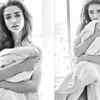 Article image for: Amy Jackson looks breath-taking as she poses behind the <i class="tbold">sheets</i>
