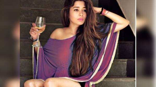 She looks stunning in an off shoulder dress