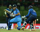 Mahendra Singh Dhoni plays a shot