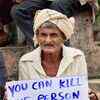 A citizen with a placard during a protest against the killing of journalist Gauri Lankesh. (Photo: PTI)