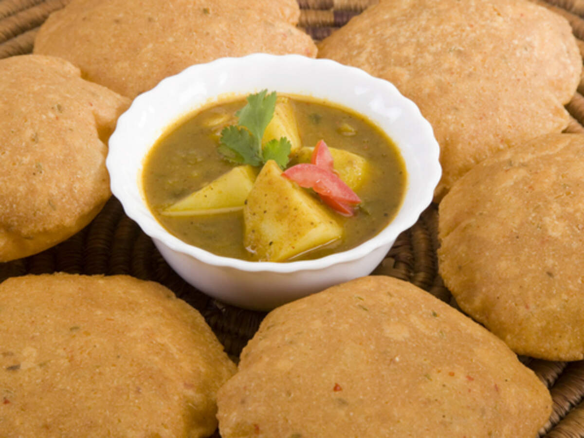 Singhare ki Poori Recipe: How to make Singhare ki Poori Recipe at Home | Homemade Singhare ki Poori Recipe - Times Food