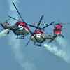 A trio of 'Sarang' helicopters performs daredevil aerobatic moves