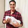 Akshay Kumar poses for a picture with Asin's baby girl