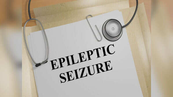 Putting something in a person’s mouth who’s going through an epileptic fit