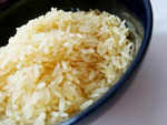 Use garlic or dried neem leaves to preserve rice