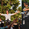 Pics: Shah Rukh Khan greets a sea of fans gathered outside Mannat