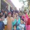 BJP's chief ministerial candidate Prem Kumar Dhumal with his family members after casting their votes