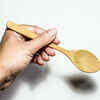 ​Holding spoon in the wrong hand