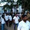 AIADMK workers and agents make a quiet and hasty exit from the counting venue.