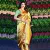 Priyanka Chopra strikes an elegant pose in a golden saree