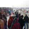 Article image for: Thousands of devotees take <i class="tbold">holy dip</i> at sangam on first day of Makar Sankranti