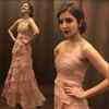 Anushka emanates her winsome charm in a peach layered gown
