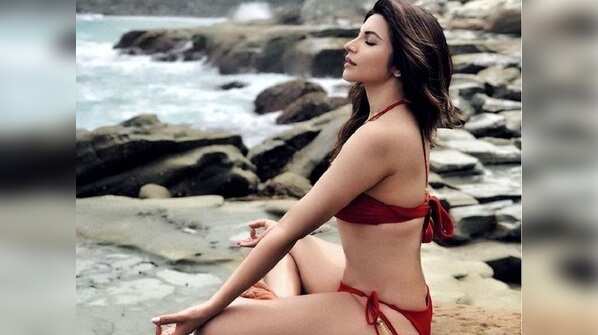PIC: Shama Sikander practices yoga in a red hot bikini