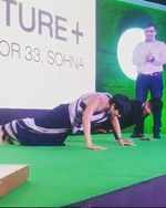 Mandira Bedi doing pushups in saree like a boss