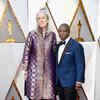 Best Documentary Feature nominees Joslyn Barnes and Yance Ford arrive at the 90th Annual Academy Awards.