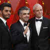 Best Documentary Feature nominees Kareem Abeed, Feras Fayyad and Søren Steen Jespersen arrive at the Oscars red carpet.