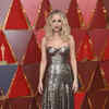 Presenter for the evening Jennifer Lawrence arrives at the Oscars.