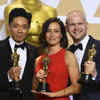 Kazuhiro Tsuji, Lucy Sibbick and David Malinowski, winners of the award for Best Makeup and Hairstyling for 'Darkest Hour', pose in the press room at the Oscars.