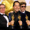 Paul Denham Austerberry, Shane Vieau and Jeffrey A. Melvin pose with their Best Production Design Award for 'The Shape of Water' in the press room at the Oscars.