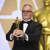 Lee Smith, winner of the award for Best Film Editing for 'Dunkirk', poses in the press room at the Oscars.