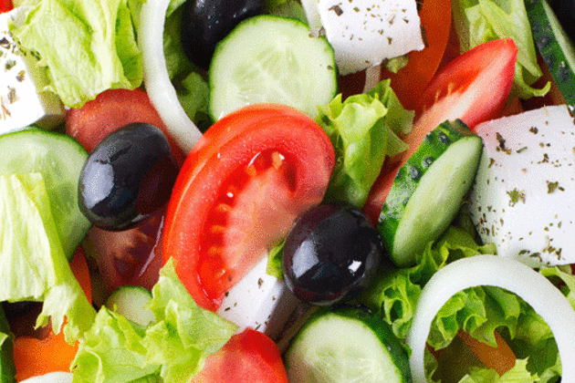 greek-salad-mixing