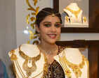Gold loses sheen on subdued global cues, muted demand