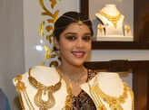 Gold loses sheen on subdued global cues, muted demand