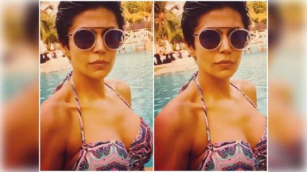 PIC: Mandira Bedi dons a bikini; beats the heat in style