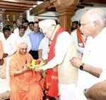 Amit Shah visits Sri Suttur Mutt, meets royal family in Mysuru