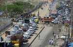 ​Stuck under Bengaluru's Hennur bridge, truck carrying 62-feet Hanuman statue causes traffic snarls