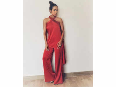 sachin and babi light blue dress Malaika Arora looks nothing short of perfection in this stunning red Amit  Aggarwal outfit