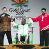 Paralifter Sachin (right) after winning bronze in men's heavyweight powerlifting