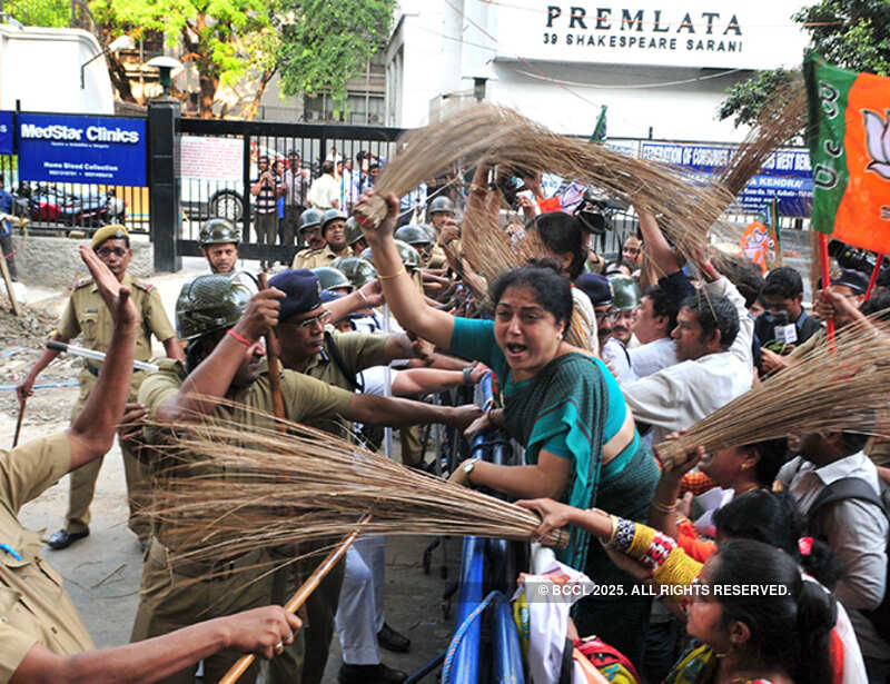 BJP members beat up police with broom