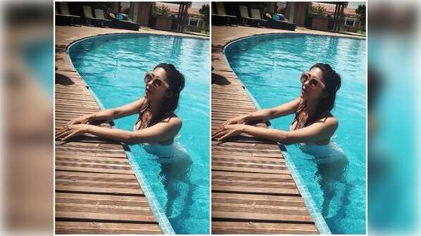 Kishwer Merchantt's love for white bikini continues as she sports another one