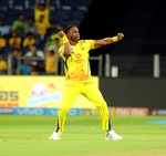 Dwayne Bravo celebrates Jos Buttler's wicket with his dance