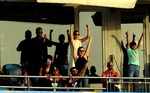 Anushka Sharma celebrates the wicket of CSK's Suresh Raina