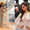 Deepika Padukone walks the red carpet in white cape gown