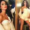 Sensuous in a white playsuit