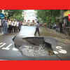Article image for: Mumbai rains: <i class="tbold">portion</i> of road caves in near Marine Lines