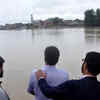 Click here to see the latest images of <i class="tbold">floods in kashmir</i>