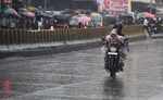 Mumbai Rains: A child enjoys a bike ride in Sion