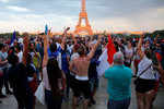 Fans celebrate in Paris after France beat Croatia 4-2