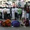 DMK supporters sitting outside the Kauvery hospital in Chennai