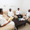 Two Sri Lankan government representatives hand over a letter from President Maithripala Sirisena wishing Karunanidhi's speedy recovery