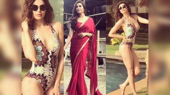 Naagin 3's Karishma Tanna sheds her saree clad avatar, sports swimwear off screen