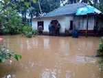 Flood waters enter buldings, displacing lakhs of people